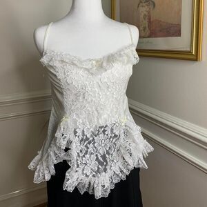 Vintage white lace lingerie corset top with ruffles and ribbon